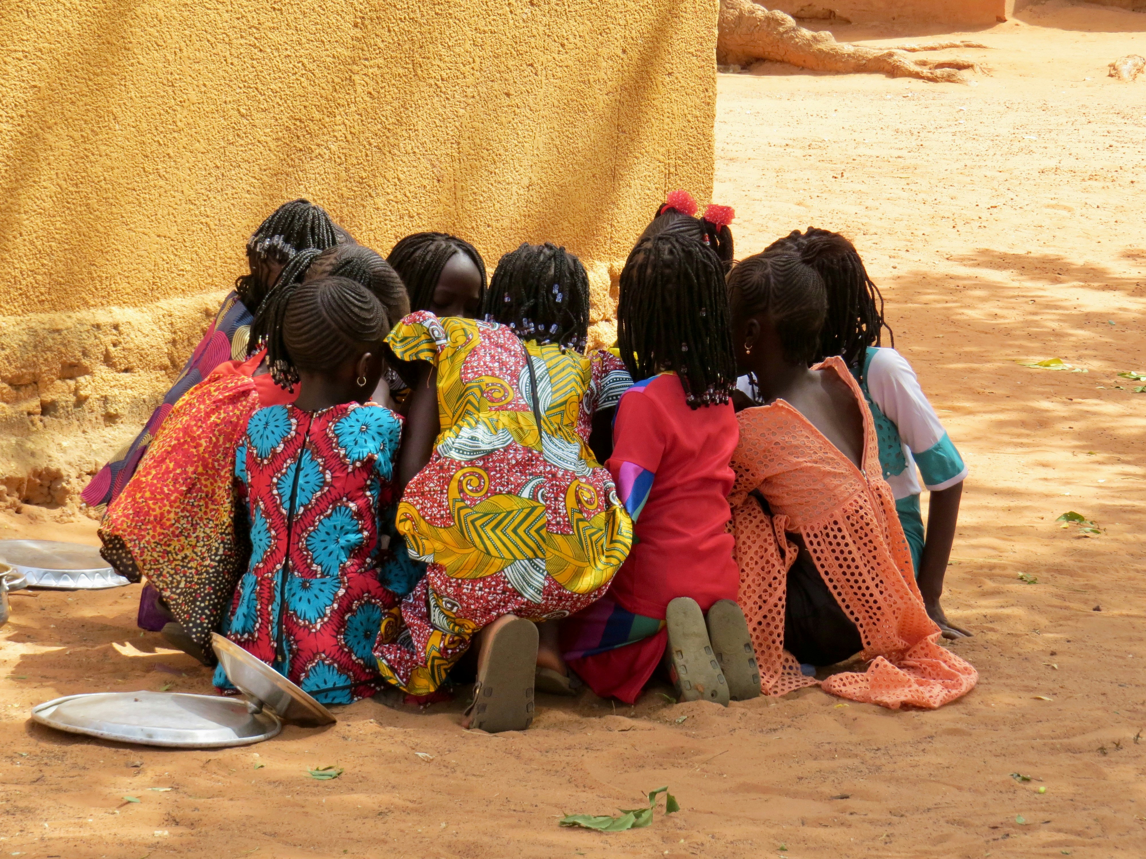 Community members in a workshop setting in rural Kenya